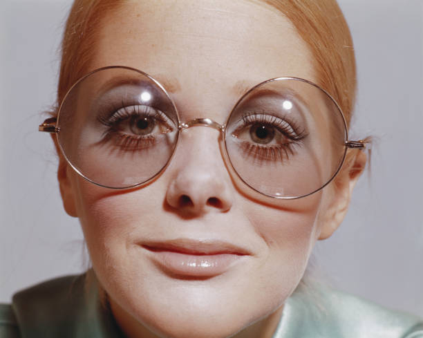 Woman wearing eyeglasses, smiling, portrait  1971 stock pictures, royalty-free photos & images