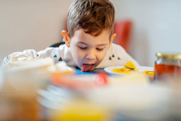 Child crying at the dinner table in cafe