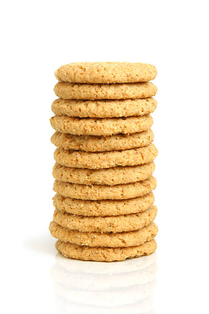 pila di biscotti di farina d'avena - oat oatmeal isolated stack foto e immagini stock