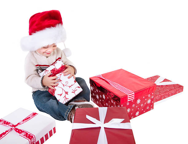 istock Child opening Christmas Gifts 119680520