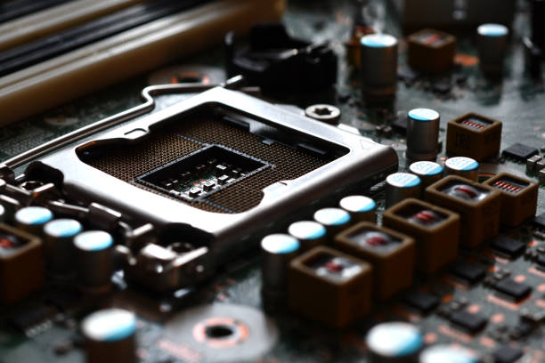 istock Detail of cpu socket on a modern computer motherboard. Electronic small component details. 1196806870