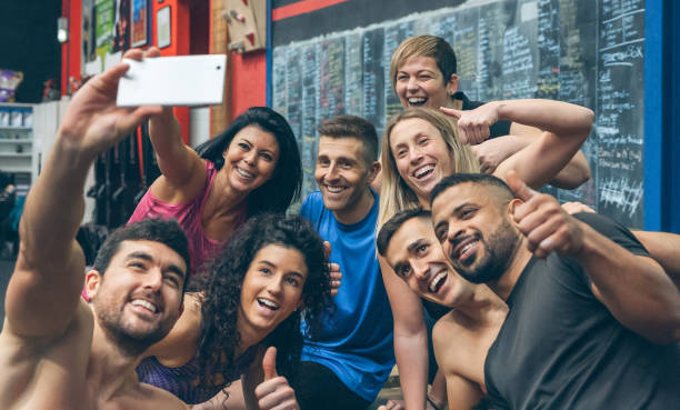 istock Athletes taking a selfie with the mobile in the gym 1196808815