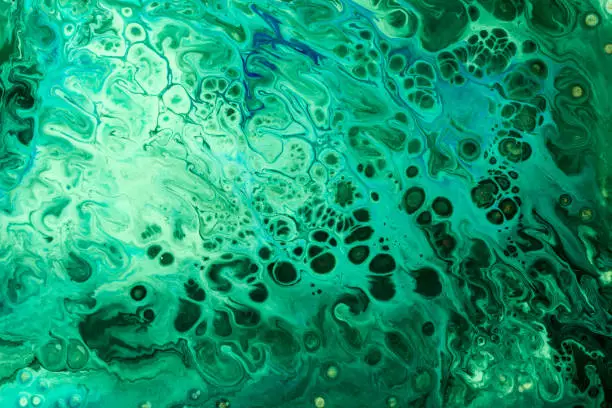 Photo of Abstract texture of liquid acrylic. Part of image.