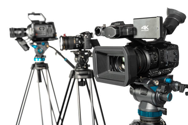 istock Broadcast cinema and dslr mirrorless cameras on white background 1196816053