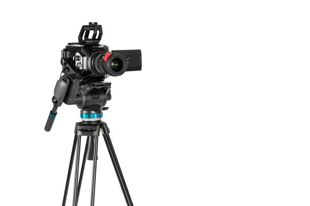 istock Professional video cinema camera on a camera tripod on white studio background 1196816183