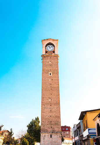 Old stone clock tower in Adana city of Turkey