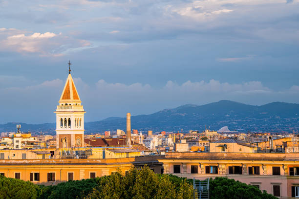 Historic Italian town of Rome, Italy cityscape skyline with high angle view of colorful architecture old buildings tower during sunset evening night Historic Italian town of Rome, Italy cityscape skyline with high angle view of colorful architecture old buildings tower during sunset evening night san lorenzo rome photos stock pictures, royalty-free photos & images