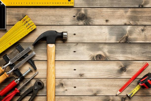 istock Work tools for carpenter on wooden background. Carpentry. 1196817641