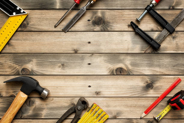 istock Work tools for carpenter on wooden background. Carpentry. 1196817642