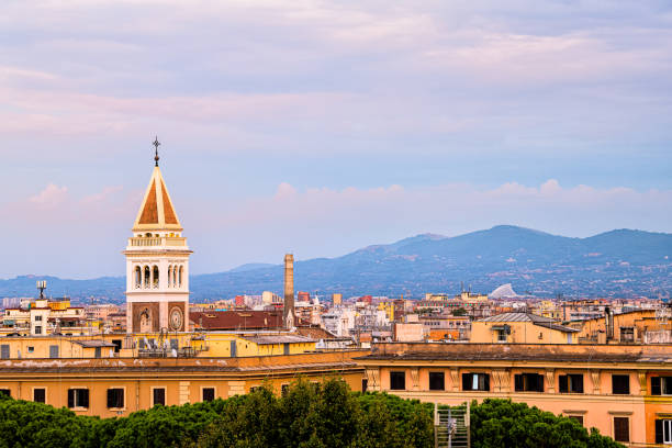 Historic town of Rome, Italy cityscape skyline with high angle view of colorful architecture old buildings tower during sunset evening twilight night Historic town of Rome, Italy cityscape skyline with high angle view of colorful architecture old buildings tower during sunset evening twilight night san lorenzo rome photos stock pictures, royalty-free photos & images