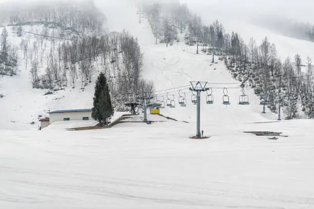 Takayama, Japan in Gifu Prefecture, Japan with ski resort lift near Okuhida Villages and Shinhotaka Ropeway with winter white snow