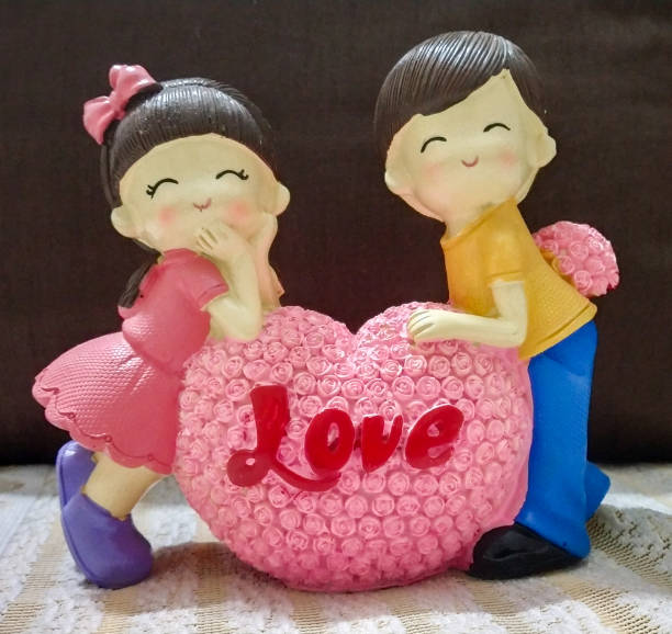 istock cute toy couple standing together gift idea for valentines day 1196819693
