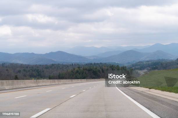 Smoky Mountains Silhouette Near Asheville North Carolina Near Tennessee Border With Cloudy Sky And Forest Trees On Steep I26 Highway Road Stock Photo - Download Image Now