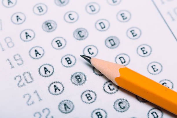 istock Fill in the answer sheet in the exam with a pencil 1196820515