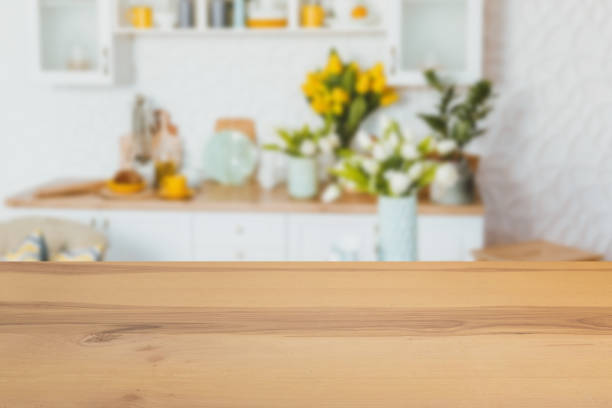 istock Wooden board empty table in front of a blurred background. Perspective brown wood with a blurred background of the kitchen and kitchen equipment - can be used to demonstrate or assemble your products. 1196820517