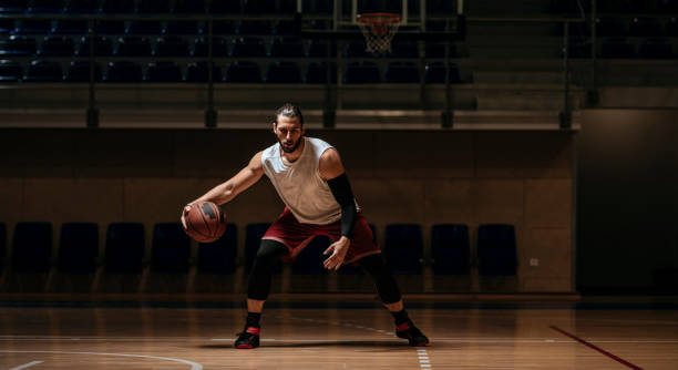 istock Basketball Player on a Court 1196820937