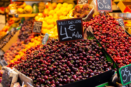 Malaga, Spain - May 24, 2019: Cherries for sale at the historic Atarazanas Market.