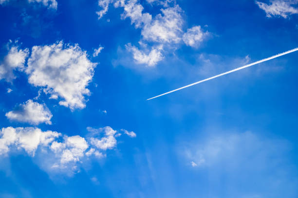 istock High-altitude jumbo jet airplane in a clear sky 1196826707