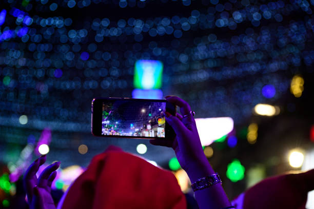 istock Girl capturing photos with smartphone 1196830136