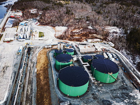 Aerial drone view of a bitumen storage facility.