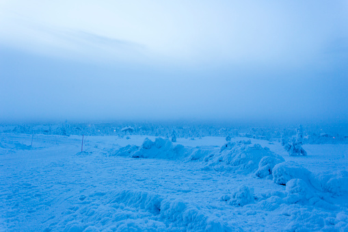 Frozen landscape during polar night in Saariselka, Finland
