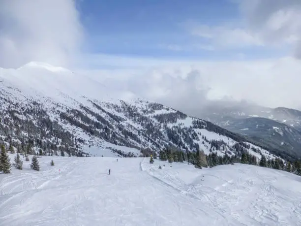 Winter panoramic view of ski pistens in Austrias Alps. Winter landscape