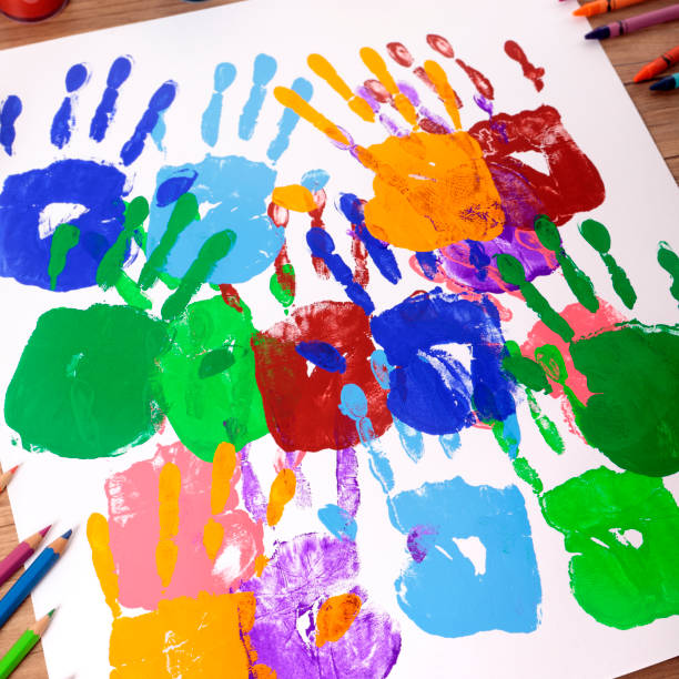 istock Handprints and art equipment 1196857459