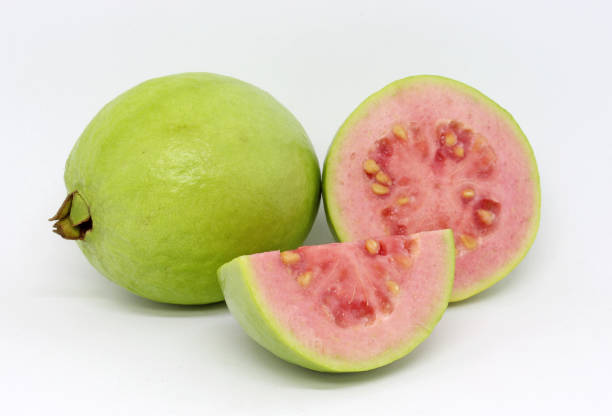 istock Delicious guava fruit on white background 1196859546