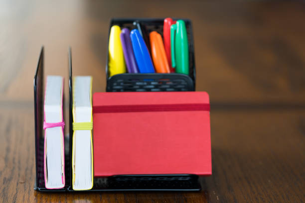 istock Office Organizer with Notebooks and felt tip markers 1196861083