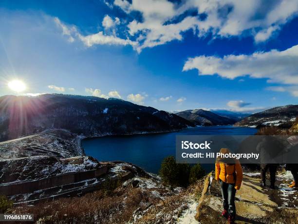 Siriu Dam Mirror Winter Lake Stock Photo - Download Image Now - Lake, Blue, Horizontal