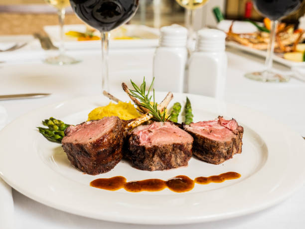 istock Fine dinning of lamb chops, asparagus and mashed potatoes with red wine. 1196867824