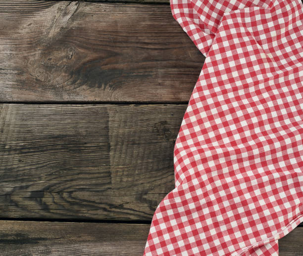 istock red-white textile kitchen towel on a wooden background from old gray boards 1196879349