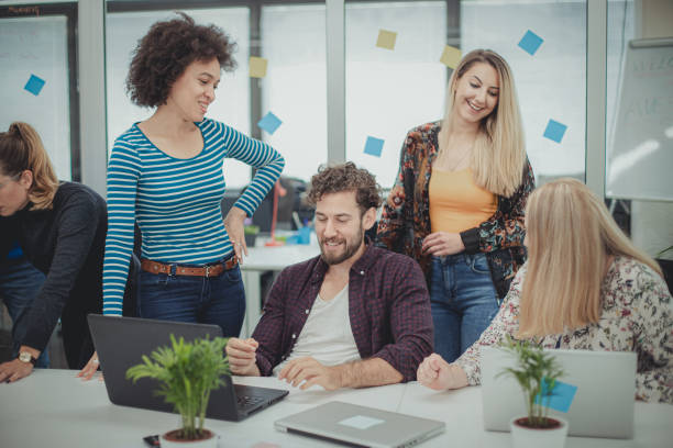 istock Friends in the office 1196879421