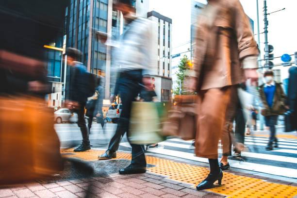 istock Long exposure shot of people commuting to work 1196879550