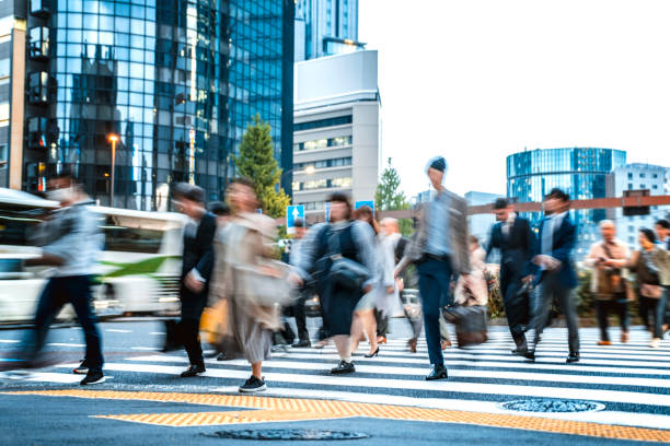 istock Long exposure shot of people commuting to work 1196879553