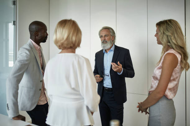 istock New Business CEO Conversing with Corporate Professionals 1196879684