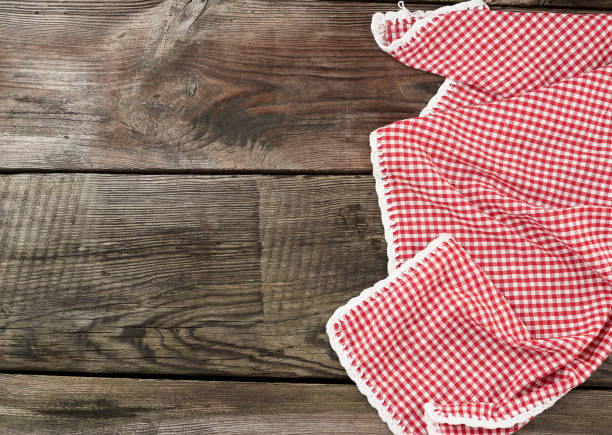 istock red-white textile kitchen towel on a wooden background from old gray boards 1196883095