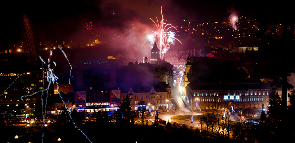 new years eve fireworks in the night sky in a European city
