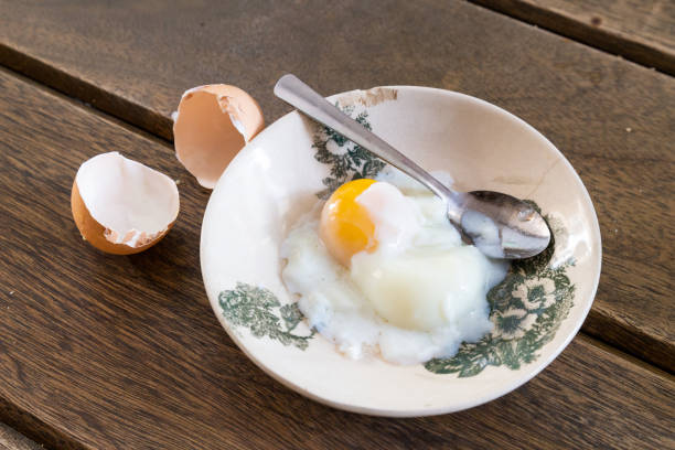 Series of hand preparing Chinese soft half boil egg for breakfast Series of hand preparing Chinese soft half boil egg for breakfast. Popular among Chinese in Malaysia kopitiam egg stock pictures, royalty-free photos & images