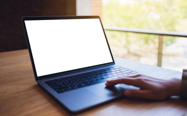 istock a woman using and touching on laptop touchpad with blank white desktop screen 1196893051