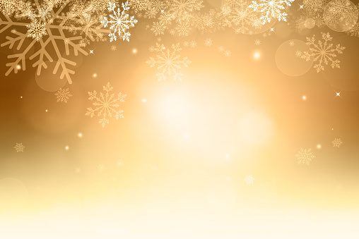 Abstract gold and white Christmas background with snowflakes and bokeh. Christmas gold background