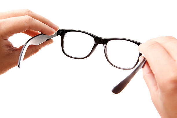 istock Hands holding classic-styled glasses 119690648
