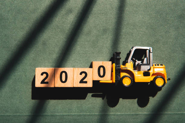 istock Miniature forklift lift up year 2020 1196907730