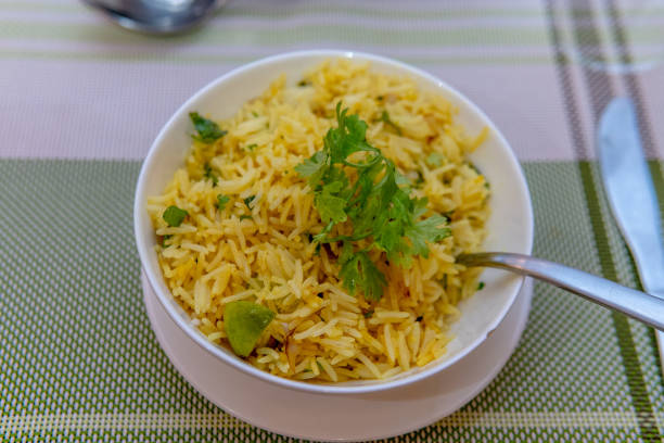 istock Yellow saffron rice with green garnish 1196907802