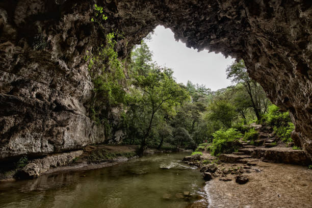 istock Arcotete natural tunnel 1196910643