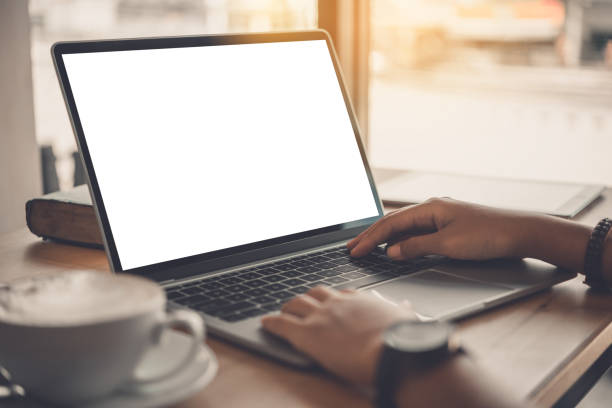 istock Business woman working on laptop computer in office 1196912981