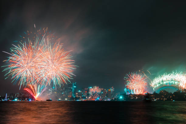 Stunning fireworks exploding in the sky over Sydney's amazing cityscape for the annual New Years fireworks marking the end of 2019 and the beginning of 2020, the new decade.