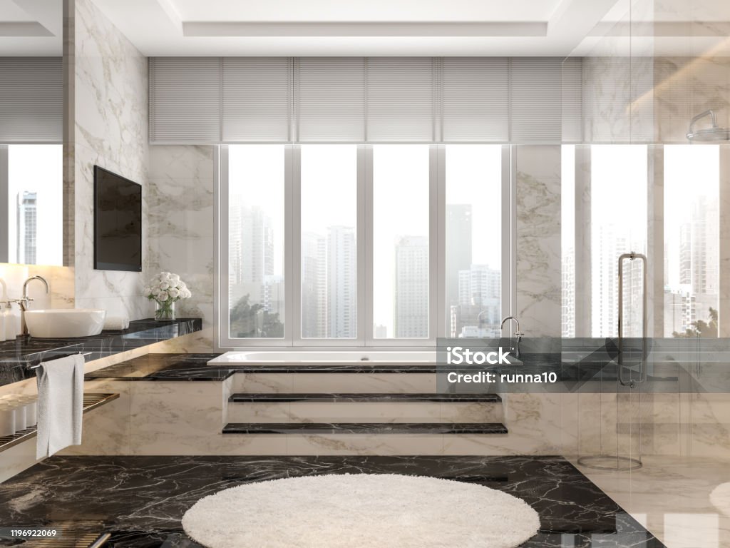 Modern luxury bathroom with black and white marble tile 3d render Modern luxury bathroom with black and white marble tile 3d render,The room has a clear glass shower partition,There are large windows looking out to the city view. Bathroom Stock Photo