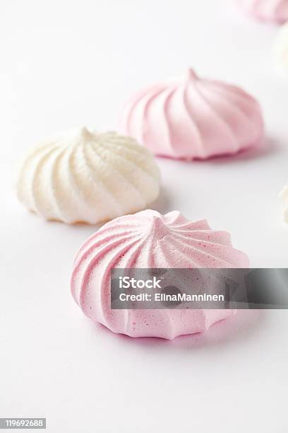 Three Pastel Colored Meringue Drops On A White Background Stock Photo - Download Image Now