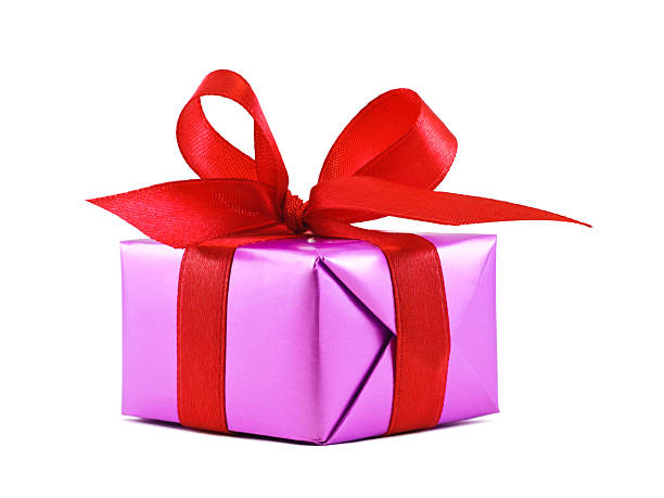 istock Purple gift wrapped present with red satin ribbon bow 119693233